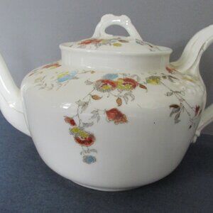 Antique teapot John Haviland Limoges porcelain white floral pattern orange